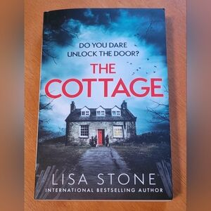 The Cottage by - Blue and Red Cover